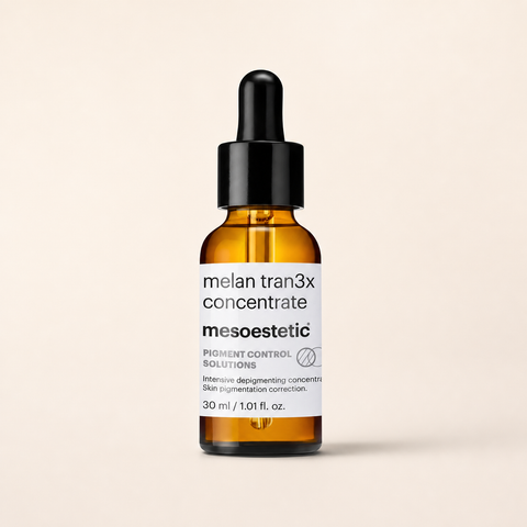 Mesoestetic Melan Tran3x Concentrate on a warm cream studio background