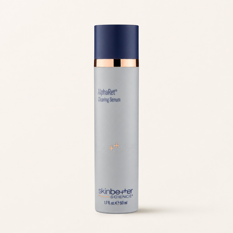 SkinBetter Science AlphaRet Clearing Serum on a warm cream background