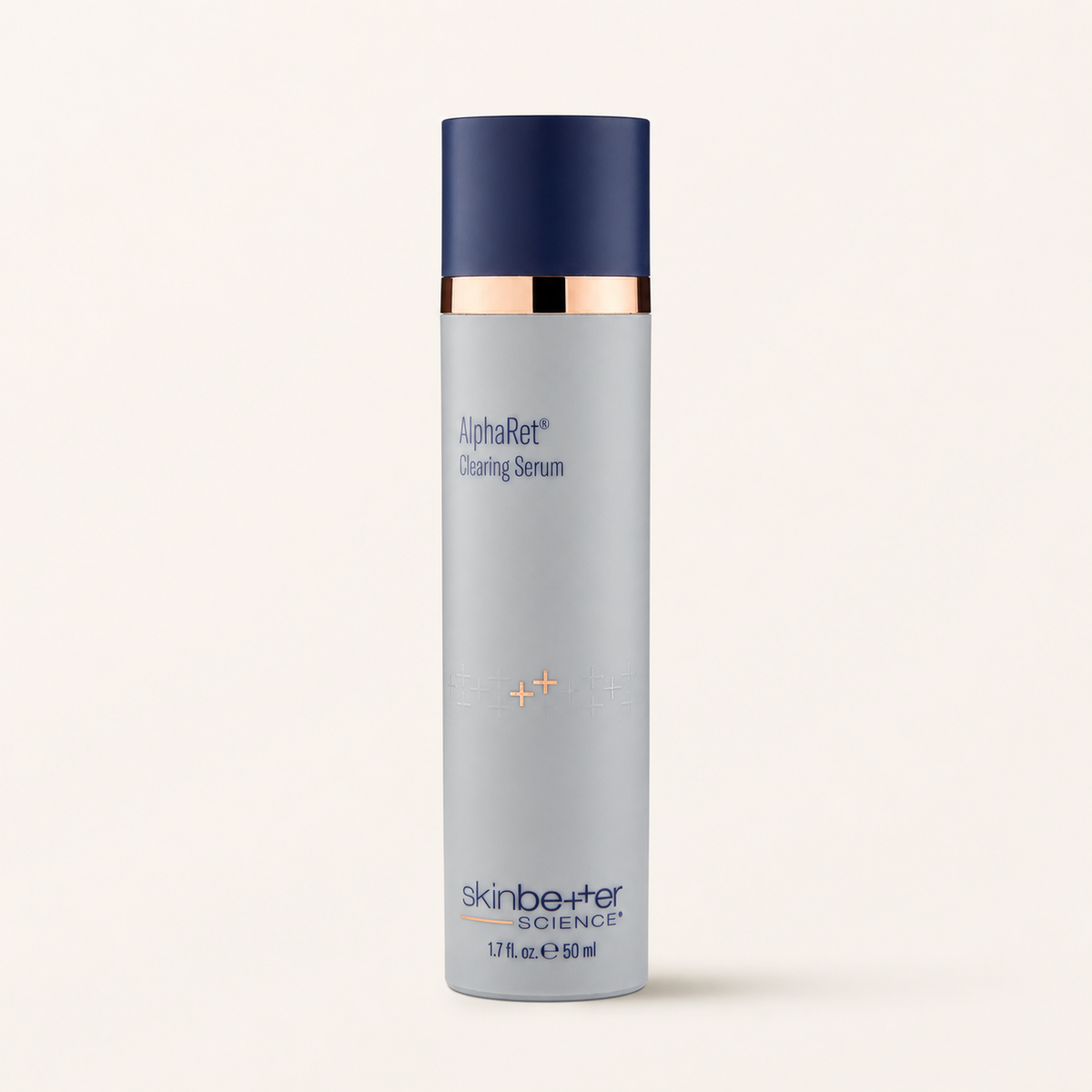 SkinBetter Science AlphaRet Clearing Serum on a warm cream background