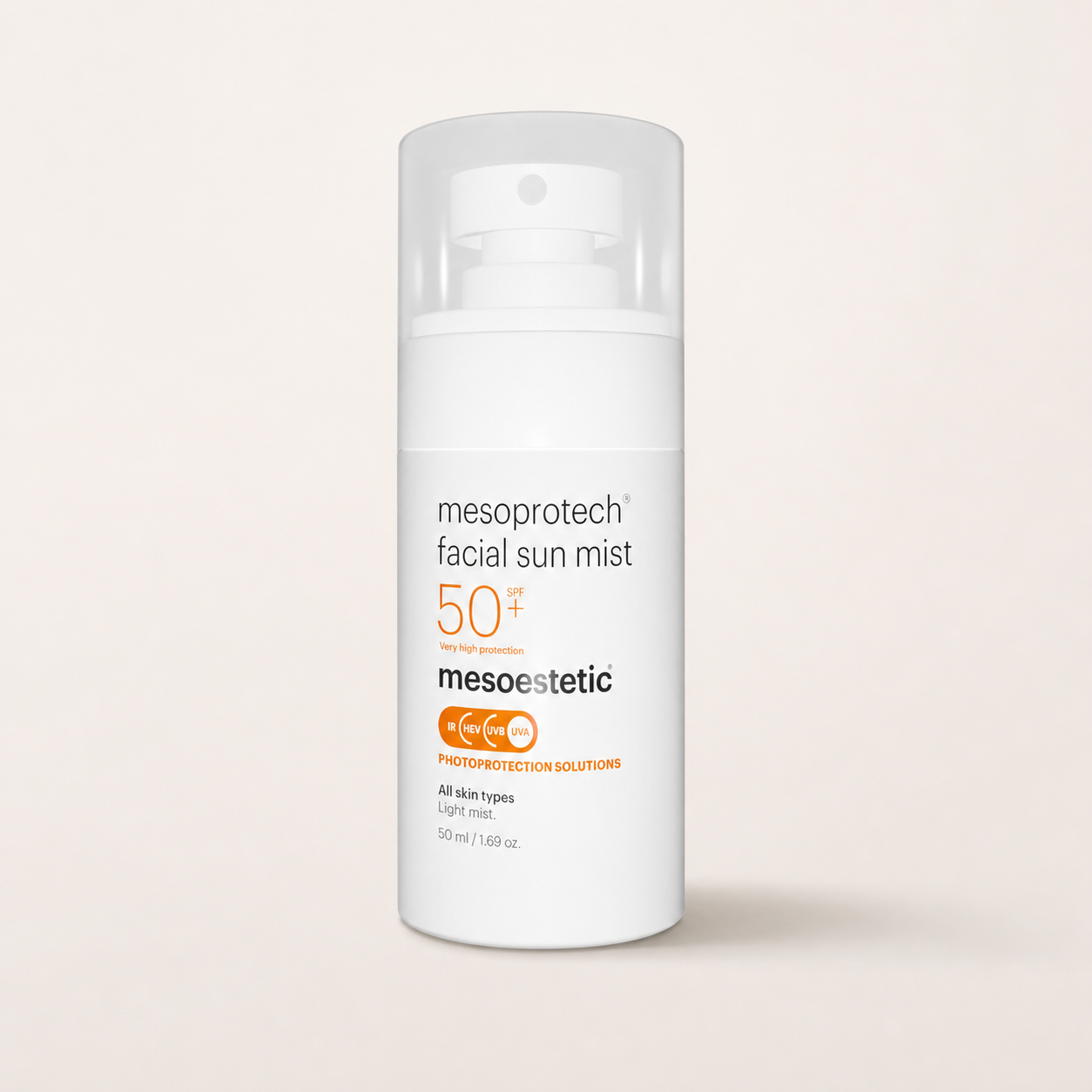 Mesoestetic Mesoprotech Facial Sun Mist SPF 50+ on a warm cream studio background