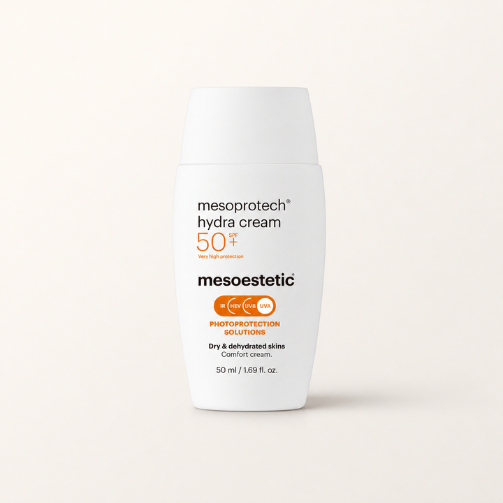 Mesoestetic Mesoprotech Hydra Cream SPF 50+ on a warm cream studio background