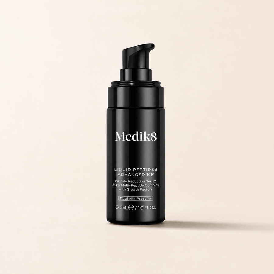 Medik8 Liquid Peptides Advanced MP on a warm cream background