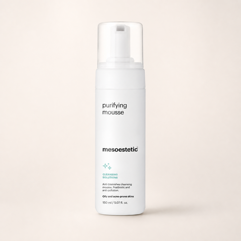 Mesoestetic Purifying Mousse Cleanser on a warm cream studio background
