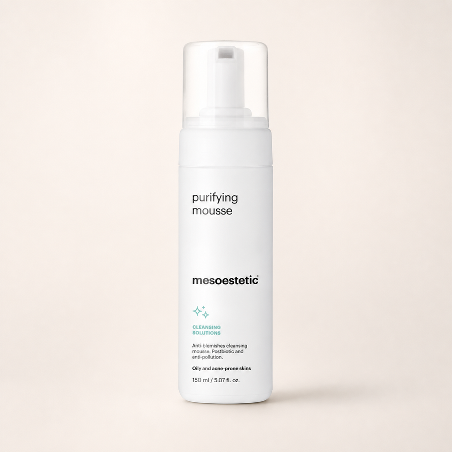 Mesoestetic Purifying Mousse Cleanser on a warm cream studio background
