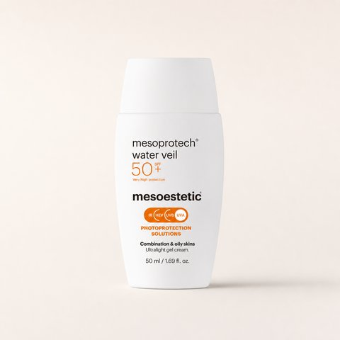 Mesoestetic Mesoprotech Water Veil SPF 50+ on a warm cream studio background
